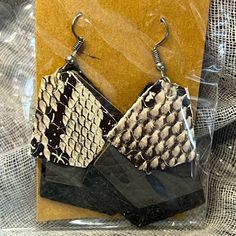 Snakes Reptile Skin Real Leather. Black, Gray, Cream White, Silver. Hypoallergenic Ear Wire. Real Leather, Snake Skin And/Or Vegan P.U. Leather. These Are Handmade With ! Elegant Black Leather Earrings, Black Leather Earrings As A Gift, Handmade Black Leather Earrings, Reptile Skin, Earrings Black, Women Artisans, Snakes, Ear Wire, White Silver