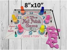 the nail polish game is shown on a white background