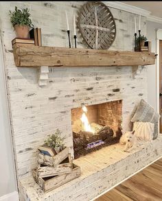 a fireplace with a clock above it and some books on the mantels next to it