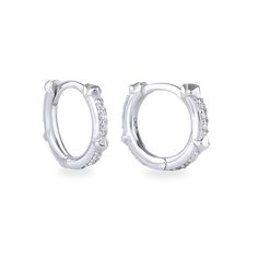 Showcasing a loop of brilliant white high-quality zirconia, our classic earring hoops offer an enduring touch of elegance. The quintessential accessory for any curated look. 925 sterling silver Cubic zirconia Inner diameter size: 8mm Earring Hoops, Classic Earrings, Classic Ring, Polish Jewelry, Curator Style, Rhodium Plated, Solid Gold, Cubic Zirconia, Hoop Earrings