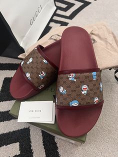 Gucci Brown Slip-on Sandals, Designer Slides With Rubber Sole And Round Toe, Designer Slides With Round Toe And Rubber Sole, Gucci Slip-on Sandals With Rubber Sole, Designer Gucci Slides With Rubber Sole, Gucci Cushioned Slip-on Sandals, Gucci Leather Slides With Rubber Sole, Gucci Slip-on Sandals With Cushioned Footbed, Gucci Leather Slip-on Slides