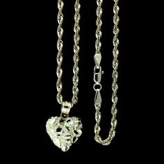 10kt Real Gold Nugget Heart And 2.5mm Rope Chain Set 10kt Real Yellow Gold Nugget Heart Charm Pendant 100% Authentic 10kt Gold Weight: 1.1 Grams Height: 0.90" Inches Width: 0.60" Inches Chain Style: Rope Chain Width: 2.5mm Chain Weight: 2-3 Grams Chain Length: 20 Inches Long Pendant & Chain Comes In 20" Inch We Carry 16" - 24" Inches Chains Please Let Us Know If You Want A Different Chain Length 100% Authentic 10kt Gold Brand - Jewelzking Lifetime Warranty For Gold 10kt Stamp For Authenticity No Yellow Gold Heart-shaped Jewelry With Figaro Chain, Gold Diamond Cut Sterling Silver Heart Necklace, Chains Pendants, Angel Pendant Necklace, Star And Moon Necklace, Gold Rope Chains, Rope Chain Necklace, Gold Nugget, Yellow Gold Pendants