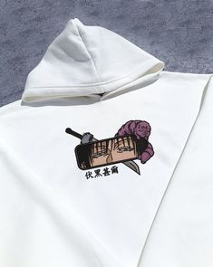 Embrace your love for anime with our custom embroidered sweatshirt! Crafted with high-quality materials and attention to detail, this sweatshirt is perfect for any anime enthusiast. Upgrade your anime-inspired wardrobe with our embroidered sweatshirt today and let your passion for anime shine! Available in sizes S, M, L, and XL, this oversize hoodie ensures a comfortable fit for everyone. Made from a blend of 90% cotton and 10% polyester, it's both soft and durable, perfect for everyday wear. Ad Anime Tees, Aesthetic Hoodie, Anime Shirt, Embroidered Hoodie, Anime Inspired, Embroidered Sweatshirts, Oversize Hoodie, Everyday Wear, Comfort Fit