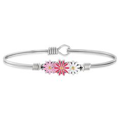 Flower- power pops like never before in our vibrant pink daisy bracelet with a perennial springtime vibe. Each hand- crafted bloom is created with a glossy enamel finish and a yellow crystal in the center for both sweetness and light in one perfect spring bracelet design. Easy hook and catch closure bracelet that measures 6.5 in. | Flower- power pops like never before in our vibrant pink daisy bracelet with a perennial springtime vibe. Each hand- crafted bloom is created with a glossy enamel fin Spring Flower Shaped Bracelet Gift, Spring Flower-shaped Hypoallergenic Jewelry, Spring Flower Hypoallergenic Jewelry, Trendy Daisy-shaped Spring Jewelry, Spring Everyday Bracelets, Pink Flower-shaped Bracelet Gift, Adjustable Daisy Bracelets For Spring, Casual Silver Bracelets For Spring, Adjustable Flower Charm Jewelry For Spring