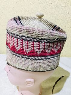 This is one of the best examples of this fabulous hat, so commonly worn throughout Muslim West Africa, that I have ever seen. In fact, typically, for a West African Muslim man he wears a fila as an important marker of his Muslim identity.  The embroidery may have been inspired, as is common for these caps, by Islamic architecture or script, whose significance is often very personal, unique to the individual for whom it was made. This hat has an interior circumference at the rim of (APPROX ~ 21.2 Pink Adjustable Flat Cap, Adjustable Pink Flat Cap, Pink Adjustable Cap, Adjustable Pink Cap, Pink One Size Fits Most Flat Cap, Adjustable Multicolor Flat Cap, Pink Adjustable Visor Hat, Handmade Multicolor Snapback Hat, Pink Crochet Hat For Beach