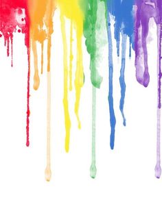 rainbow paint dripping down the side of a white wall