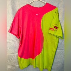 Nwt Oversized Size Small Women’s Nike Tee. Bright Pink And Neon Green. Nike Green Graphic Print T-shirt, Nike Green T-shirt For Streetwear, Oversized Nike T-shirt With Graphic Print, Nike Oversized T-shirt For Streetwear, Green Oversized Color Block Tops, Oversized Green Color Block Top, Nike Red T-shirt For Summer, Oversized Multicolor Sporty Tops, Sporty Oversized Multicolor Tops