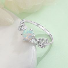 The metal in the Silver Round White Opal Ring For Women used is lead-free, Nickle-free, and will not cause any skin issues. This ring is coated in a special anti-tarnish polish that preserves its luster and shines for a long. This ring comes with a fancy gift box. A perfect gift for yourself, friends, birthday, mother's day, Wedding, or Anniversary. Your jewelry should be stored in the original pouch provided when you are not wearing it, keep your jewelry dry and clean, and avoid any contact wit Opal Jewelry Set, Silver Opal Ring, White Opal Ring, Sterling Silver Wedding Rings, Jewelry Catalog, Fire Opal Ring, Leaf Ring, Silver Wedding Rings, Opal Ring