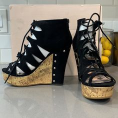 This Chic Bootie Sandal From The Madison Collection Gets A Modern Upgrade From Peekaboo Cutouts And Lace-Up Styling. Zuska Rests On An Earthy Cork-Effect Platform Wedge With Opulent Studded Accents On The Heel. Purple Snake, Floral Wedges, Wooden Wedges, Platform Wedge Heels, Bootie Sandals, The Madison, Platform Wedge, Shoe Dazzle, Platform Wedges