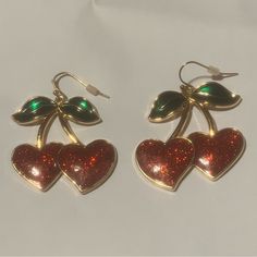 Sparkly Shiny Bright Red Nautical Whimsical Heart Shaped Cherry Earrings. In Excellent Condition, New And Never Worn. Cherry Colored Jewelry For Valentine's Day Party, Cherry Color Jewelry For Valentine's Day Party, Cherry-colored Jewelry For Valentine's Day Party, Cherry Jewelry For Valentine's Day Party, Trendy Red Metal Earrings, Retro Jewelry For Valentine's Day Party, Red Vintage Jewelry For Summer, Red Vintage Jewelry For Holidays, Vintage Red Jewelry For Holidays