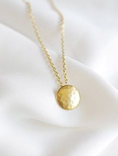 full moon . petite // silver or gold . tiny hammered circle necklace . textured disc pendant . minim Hammered Gold Pendant, Dainty Round Disc Coin Necklace Tarnish Resistant, Dainty Hammered Jewelry For Everyday, Dainty Tarnish-resistant Round Disc Coin Necklace, Everyday Minimalist Hammered Charm Necklaces, Everyday Hammered Round Disc Coin Necklace, Minimalist Hammered Coin Necklace, Delicate Everyday Hammered Jewelry, Delicate Hammered Jewelry For Everyday