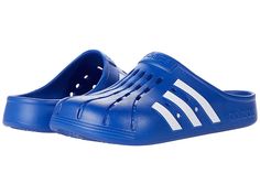 adidas Adilette Clog - Shoes : Team Royal Blue/White/Team Royal Blue : For a casual, cool vibe, head to your work out in the comfy adidas Adilette Clog. Based on the iconic adidas slide, these sport-inspired clogs have a soft feel and are both functional and comfortable featuring a contoured EVA footbed. Sport-inspired clogs with a soft feel. Slip-on construction. Contoured EVA footbed. Regular fit. Upper, lining, insole, and outsole made of synthetic material. Imported. Measurements: Weight: 5 Sporty Slip-on Slides For Outdoor Activities, Comfortable Slip-resistant Sports Slides, Sporty Slip-resistant Clogs For Outdoor Activities, Sporty Synthetic Slip-on Clogs, Breathable Clogs For Summer Outdoor Activities, Summer Slip-on Clogs For Outdoor Activities, Sporty Slip-on Slides For Sports, Summer Clogs With Rubber Sole For Outdoor Activities, Functional Low-top Synthetic Slides