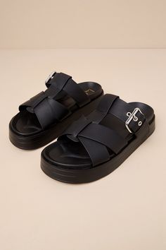 Create looks that are always chic and ready for fun with the Lulus Surie Black Strappy Flatform Slide Sandals! Smooth faux leather shapes these must-have sandals that feature an almond-shaped footbed and a cage-style upper composed of crisscrossing straps and an adjustable vamp strap that secures with a silver buckle detail. A .5"" contoured insole and a trendy flatform sole complete the sleek slide-on design! Available in whole sizes only. 1" flatform sole. Lightly cushioned contoured insole. R Summer Synthetic Footbed Sandals With Buckle Closure, Summer Footbed Sandals With Open Heel, Synthetic Open Heel Footbed Sandals For Summer, Summer Synthetic Footbed Sandals With Open Heel, Summer Synthetic Open Heel Footbed Sandals, Modern Flat Footbed Sandals For Spring, Trendy Synthetic Flip Flops With Buckle Closure, Strappy Wedge Sandals With Buckle For Beach, Strappy Wedge Sandals With Buckle Closure For Beach