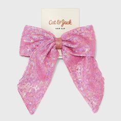 The Girls' Sequin Bow Barrette from Cat & Jack™ in charming pink lends sparkle to any outfit. With an easy-to-use design, the barrette effortlessly secures hair in place. Whether she's dressing up for a party or simply adding flair to her everyday look, this girls’ sequin bow barrette from Cat & Jack™ adds a pop of shimmer. Cat & Jack™: Classics with an imagination of their own Summer Hair Accessories With Decorative Bow For Gifts, Adjustable Decorative Bow Hair Accessory For Summer, Adjustable Hair Accessories With Decorative Bow For Summer, Spring Party Hair Accessories With Decorative Bow, Trendy Summer Party Headband, Summer Party Hair Accessory With Decorative Bow, Summer Party Hair Accessories With Bow, Party Headband With Decorative Bow, Trendy Pink Party Headband