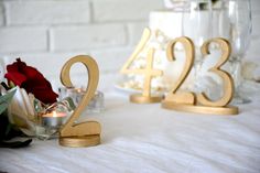 the table is set up with candles and flowers