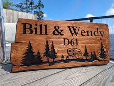 a wooden sign that says, bill and wendy's d o 1 on it