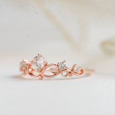 A romantic and feminine princess ring with delicate details, perfect gift for your little princess! Stone: Nature white Topaz in 4mm & 2.2mm. Bandwidth: 1.1mm Metal: 14k rose gold plated sterling silver base Elegant Rose Gold Topaz Ring With Diamond Accents, Elegant Rose Gold Crystal Ring With Rose Cut Diamonds, Elegant Rose Gold Crystal Ring With Diamond Accents, Elegant Rose Gold Crystal Ring For Anniversary, Delicate Rose Gold Diamond Crystal Ring, Elegant Rose Gold Flower Ring For Promise, Delicate Topaz Wedding Ring, Elegant Rose Gold Flower Promise Ring, Rose Gold Crystal Ring With Diamond Accents For Promise