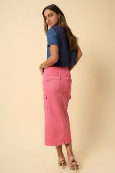 Expertly crafted from durable cargo denim, this midi skirt in a soft pink hue offers a versatile and stylish addition to any wardrobe. Its cargo design adds both functionality and a touch of edginess to this classic piece. Perfect for a casual yet chic look. - 100% Cotton- Non-Stretch Denim- Color Cargo Slim Boot- Front Zipper Fly- 7 pocketsModel is wearing size S . Height 5'8Waist 28"Hip 36"Front Rise 30"Sweep 35" Style: Casual Print / Pattern: Pink Dye Denim Silhouette: Cargo Fit: Midi Embelli Cargo Fit, Cargo Midi Skirt, Dye Denim, Pink Dye, Denim Color, Cute Blouses, Cargo Skirt, Cool Graphic Tees, Love Clothing