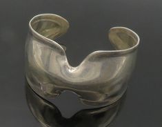 "RLM STUDIO 925 Sterling Silver - Vintage Shiny Smooth Cuff Bracelet - BT5701  RLM STUDIO 925 Sterling Silver - Vintage Shiny Smooth Cuff Bracelet - BT5701  Jewelry Type:         Bracelet   Metal Type:            925 Silver  Metal Size:             6.5\" Length   1.5\" Height   Stone Type:            N/A  Condition:              N/A  Jewelry Weight:     44.1 Grams  PLEASE NOTE: THIS ITEM IS PRE-OWNED. ALTHOUGH MOST ITEMS ARE IN VERY GOOD CONDITION, SOME MAY NEED CLEANING AND/OR MINOR REPAIRS. WE Bracelet Metal, Metal Bracelets, Fashion Accessories Jewelry, Silver Cuff, Antique Rings, Piercing Jewelry, Beautiful Necklaces, Cuff Bracelet, Types Of Metal