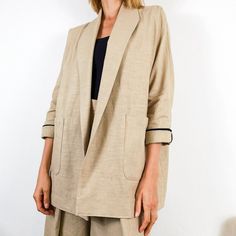 LINEN JACKET, shawl collar / shawl-collared linen jacket. 100% pure linen. Handmade, in Italy with quality fabric. Small artisanal production. Comfortable model. Patch pockets. Shawl collar, without closures. Maximum versatility. SIZE from XS to M - length (from the center back neckline) 75 cm = 29.5 inches (collar excluded) SIZE from L to XXL - length (from the center back neckline) 75 cm = 29.5 inches (collar excluded) SIZE GUIDE: Some of my garments are wearable from multiple sizes (shirts, t Linen Blazer For Work, Solid Linen Blazer For Work, Linen Blazer For Workwear, Beige Linen Blazer For Workwear, Beige Linen Blazer For Work, Linen Blazer With Lapel Collar, Neutral Linen Outerwear With Notch Lapel, Beige Linen Blazer With Lapel Collar, Fall Linen Outerwear With Suit Collar