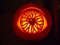 a pumpkin carved to look like a wheel