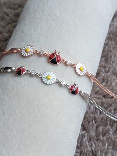 Sterling Silver Ladybug Bracelet-Daisy Flower Bracelet-Dainty Handmade Bracelet-Custom Bracelet-Populer Bracelet-Luck Bracelet-Love Bracelet-Bracelet for Women-Enameled Bracelet-Initial Bracelet-Gift For Her-Birthday Gift-Gift For Mom-Gift-Christmas Gift-New Year Gift-Bridesmaid Gift-Anniversarry Gift-Graduation Gift- Our product is produced with care from 925 Sterling Silver. There are 2 Models in our Bracelet. Enamel Application is Made on Daisy and Ladybug Figures. Our bracelet has 2 rows of Flower-shaped Bracelets With Charms For Gift, Delicate Adjustable Round Charm Bracelet, Flower Charm Bracelet As A Gift, Flower Shaped Charm Bracelet For Gift, Dainty Adjustable Bracelet For Birthday, Floral Charm Bracelet Gift, Adjustable Flower-shaped Charm Bracelets, Adjustable Flower-shaped Bracelets With Charms, Adjustable Flower Charms Bracelets