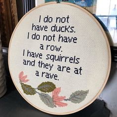 a cross - stitch pattern with words on it that says i do not have ducks, don't have a row, have squirrels and they are at a rave