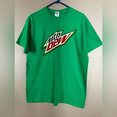 Vibrant Green, Mountain Dew Short Sleeve T-Shirt. Brand New, Never Worn. Unisex- Size Large Mountain Dew, Green Mountain, T Shirt Brand, Vibrant Green, Shirt Brand, Man Shop, T Shirts, Brand New, Tags