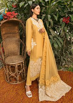 Simple Pakistani Party Dresses Embroidered Salwar Kameez is a charismatic masterpiece to have a head-turning appearance on the big day. This perfectly stitched Kameez Trouser is in lavish cotton fabric and is emblazoned with lavish designs and floral details. Kameez: The beautiful kameez in an alluring mustard shade comes in premium cotton fabric. The stunning cotton kameez is emblazoned with graceful embroidery work. Lavish designs and floral details give a perfect finishing to this mustard-hue Shirt Colour Combination, Pakistani Party Dresses, Shirt Combination, Saira Shakira, Embroidered Salwar, Shirt Colour, Punjabi Dress, Cotton Slip, Cotton Dupatta