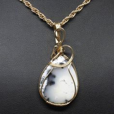 "Details About This Pendant: The contemporary stone pendant is hand crafted using fine precious metal wire and natural gemstone to form this stunning delicate enhancer. The bail is large enough to accommodate various styles of chains. It is not mass produced nor manufactured. *Natural Dendrite Agate Gemstone (30mm x 25mm Teardrop Shaped). *Pendant Size: 2 1/4\" long including bail x 1\" at widest point. Includes free 18\" chain. *Precious metal is lead free, nickel free, does not tarnish. To pro Wire Wrapped Round Agate Jewelry, Wire Wrapped Agate Pendant Jewelry, Hand Wrapped Agate Pendant Jewelry, Teardrop Agate Wire Wrapped Jewelry, Wire Wrapped Teardrop Agate Jewelry, Elegant Hand Wrapped Round Pendant Necklace, Yellow Gold Wire Wrapped Jewelry For Healing, Gold Jewelry With Natural Moss Agate Stones, Gold Wire-wrapped Agate Jewelry