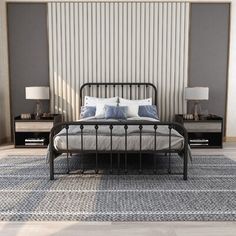 a bed sitting on top of a rug in a bedroom