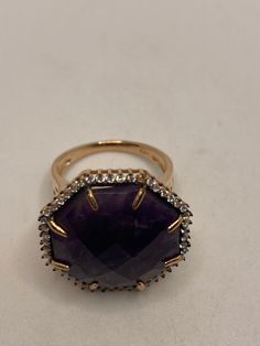 Vintage Ring golden 925 Sterling Silver Unusual Deep Toned amethyst surrounded by clear crystals 925 Sterling Filigree Setting Handmade Can be resized My jeweler charges $10-$20 All rings are shipped free in the US in a nice gift box. Check out our over a THOUSAND great reviews!!! Engraving is $4 per letter and is not always perfect depending on the piece. It can take a few days if the jeweler is busy. This is payable to Paypal Judithsltd@gmail.com Elegant Amethyst Rings For Parties, Elegant Amethyst Party Rings, Elegant Round Amethyst Ring For Party, Fine Jewelry Amethyst Ring With Vs Clarity, Luxury Amethyst Ring Jewelry, Formal Faceted Amethyst Ring Fine Jewelry, Formal Faceted Diamond Rings, Gold Gemstones With Diamond Accents, Round Shape, Formal Faceted Amethyst Jewelry