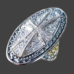 Gorgeous Large Ladies Statement Ring Dazzles With A Beautiful Cross In An Oval Shaped Setting Embellished With Cubic Zirconia Stones And Finished With Touches Of 14k Gold. Details: Stamped 925 14k Gold Filled Accents. Nwt Ladies Size 7.5 Approximately. (Large Rings Tend To Fit Snugger). Please See Photos For Additional Details. Product Color May Differ Slightly From Photos Due To Differences In Color Monitors And Lighting. Smoke Free Home. Will Be Packaged And Shipped With Care. Bundle Your Favo Classic Sterling Silver Jewelry With Rhinestones, Silver Sterling Silver Ring With Rhinestones, Sterling Silver Rings With Rhinestones, Sterling Silver Rhinestone Ring, Silver Ring With Rhinestones As Gift, Silver Rings With Rhinestones Fine Jewelry, Silver Rings With Rhinestones As Gift, Oval Sterling Silver Diamond Ring With Pave Setting, White Gold Rings With Rhinestones As Gift