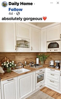 a kitchen with white cabinets and wood counter tops is featured on the instagram page