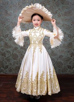 Girls Christmas Masquerade Dress Kids Rococo Baroque Style Ball Gown Dress     Condition: Brand New   Color: amp;nbsp; Beige   Material: This Girls Baroque Style Dress is made of amp;nbsp; High Quality Satin, soft and comfortable to wear   Sleeve Length: Full Sleeve   Dresses Length:Ankle-Length   Neckline: amp;nbsp; Stand Collar   Decoration: Ruffles + Lace   Style: This dress is perfect for civil war,victorian,medieval,regency,renaissance, wedding, cosplay, themed party, photograph, stage perf Gold Ball Gown For Fancy Dress, Festive Gold Ruffle Dress, Festive Gold Ruffled Dress, Fitted Floor-length Princess Dress, Elegant Gown With Ruffles For Fancy Dress, Elegant Ruffled Gown For Fancy Dress, White Floor-length Dress For Costume Party, Festive Princess Dress In Gold, Festive Princess Gold Dress