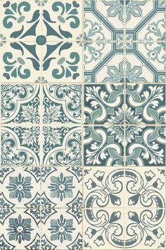 blue and white tiles with different designs on them