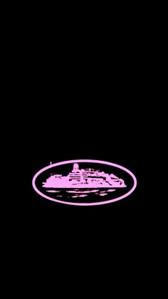 a pink and black photo of a ship in the dark with an oval frame around it