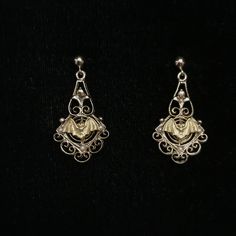 These are Victorian style filigree drops with a gold brass bat hang from a gold filled post earring. The delicate, gold plated, open work earrings have great detail including three tiny seed pearls. They are very lightweight and drop to about 1.25 inches.  The tiny bat added to the circa 1950's earrings measure a little under .5 inch. This piece of jewelry is sent in a bubble pack envelope via US postal service, first class mail with insurance and packed in a gift box. International rate is $23. Victorian Filigree Chandelier Dangle Earrings, Victorian Filigree Drop Earrings, Victorian Style Filigree Drop Earrings, Gold Steampunk Dangle Jewelry, Steampunk Gold Dangle Jewelry, Victorian Filigree Dangle Jewelry, Gothic Pierced Jewelry For Wedding, Gothic Dangle Earrings For Wedding, Handmade Gothic Gold Earrings