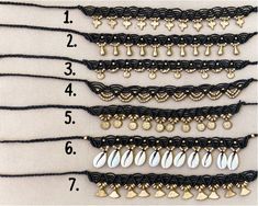 a number of different types of bracelets on a white surface with numbers in the middle