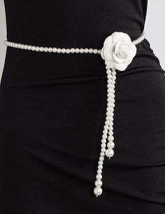 Fleur de Camélia Pearl Camellia Waist Belt in Pearl. 41.5" costume pearl strand. Silver tone claw clasp closure. Completely adjustable. Can be worn as necklace or belt. Removable white felt camellia pin. Camelia 3" diameter. Resort Accessories, Rococo Sand, Minnie Rose, Pearl Strand, Ronny Kobo, Ribbon Belt, Kids Denim, Pearl Strands, Denim Flares