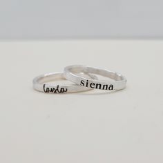 Mother's Day Gift | This personalized stacking ring features a unique and stylish handwriting font or serif font, adding a personal touch to your jewelry collection. Handmade with care, each ring is crafted with fine silver materials for a luxurious look and feel. Make a statement with this modern and customizable piece. Includes one name ring in your choice of font. Personalized Silver Engraved Ring, Everyday Stackable Rings With Custom Name, Adjustable Engraved Stackable Ring For Everyday, Everyday Adjustable Stackable Engraved Ring, Minimalist Stackable Rings With Custom Name For Anniversary, Customizable Sterling Silver Stackable Rings For Everyday, Custom Name Adjustable Rings For Everyday, Personalized Adjustable Rings For Everyday, Customizable Adjustable Stackable Rings For Everyday