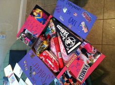 a pile of candy sitting on top of a tiled floor next to a blue table