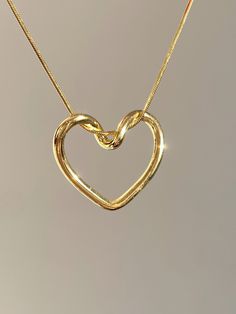 "HEART NECKLACE WITH SNAKE CHAIN Material: High Quality Solid 925 Sterling Silver Color options: Silver, Gold, Rose Gold Necklace length: 16 Inches (40 cm) All pieces will come with a 2\" extension chain so you can fine tune the fit. ♡ The most unique jewelry you can find, perfect gift for you and your loved one. ♡ All of our jewelry is handcrafted with enthusiasm and great care in our workshop. ► HOW TO CARE FOR YOUR JEWELRY * Maintain your jewelry's high shine by avoiding contact with any chemicals such as soap, perfume, lotion, makeup, hair & cleaning products. * Keeping your jewelry in a pouch or a box after using it will prolong the life of your jewelry. * Not recommended for sensitive and allergic skin. * You can do your product maintenance with a cotton-soft dry cloth. * You can kee Silver Unique Jewelry, Heart-shaped Gold Chain Necklace, Gold Heart-shaped Necklace For Gift, Luxury Gold Heart Necklace, Elegant Style, Gold-tone Heart Pendant Jewelry For Gift, Cute Pendant Necklace, Gold Heart Jewelry, Heart Shape Jewelry