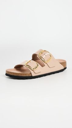 Birkenstock Arizona Big Buckle High Shine Sandals | Shopbop Spring Gold Footbed Sandals With Buckle Closure, Leather Footbed Sandals With Gold Buckle For Spring, Gold Slide Footbed Sandals With Buckle, Gold Slide Footbed Sandals With Buckle Closure, Gold Buckle Footbed Sandals For The Beach, Gold Footbed Sandals With Removable Insole, Gold Buckle Closure Footbed Sandals For Beach, Gold Footbed Sandals With Buckle Closure For Beach, Gold Footbed Sandals With Buckle For Beach