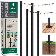 the black poles are set up with lights on them and in front of an open box