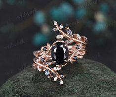 - Metal: Solid gold(10K/14K/18K white/yellow/rose gold),925 sterling silver,platinum available- Main Stone: 6x8mm oval natural black onyx- Accent Stone: 1.5mm round black spinels- Wedding Band Stone: alexandrites and moissanites- Band Width: 1.3-1.4mm- Can be personalized: Yes Vamp Wedding, Goth Engagement, Goth Engagement Rings, Black And Gold Ring, Onyx Rings, Engagement Ring Nature, Band Rings Women, Metal Roses, Nature Engagement Ring