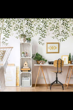 a living room filled with lots of furniture and plants on top of a wooden floor