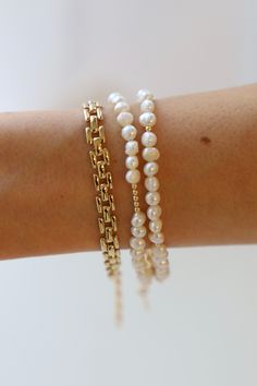 This is not your average pearl bracelet... Our Pearl Double Wrap Bracelet with white pearls features a double wrap style with with gold beaded accents. Wear solo or stacked with your favorite pieces!Materials: Medium pearls and gold filled beads with a gold plated coin ending. Length: Measures an adjustable 14-15" with an inch and a half extenderSKU: B1189GMaterials + Care Gold Pearl Beaded Bracelets With Pearl Chain, Gold Pearl Bracelet With 14k Gold Filled Pearl Chain, Gold 14k Gold Filled Pearl Chain Bracelet, Gold Pearl Chain Bracelet In 14k Gold Filled, Gold Beaded Bracelet With Pearl Chain, Gold Pearl Chain Beaded Bracelet, 14k Gold Filled, Gold Pearl Chain Beaded Bracelet In 14k Gold Filled, Double Wrap Bracelet, Sneaker Slippers