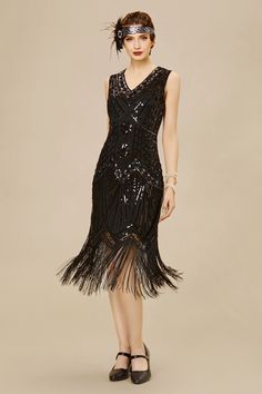 This fringed dress is classic vintage look for a modern woman. The eyecatching design features art deco print and unique vintage style which bring you back to the roaring twenties. Features: V neck style Sleeveless design Side zipper closure Blinking beads and sequins 1920s Dress Vintage, Gatsby Dresses, Fringed Dress, Great Gatsby Dresses, 1920s Dresses, The Roaring Twenties, Gatsby Dress, Art Deco Print, Fantasy Wardrobe