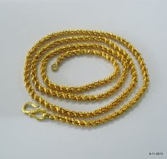 20k gold chain necklace from rajasthan india. Length - 57.5 cm(22.6") we can adjust the length. Thickness - 3 mm weight - 11 grams Material - 20k yellow gold.  Note-All the items appear In Pictures larger than actual in size so please check measurements carefully before purchase. Traditional 22k Gold Chain Necklace For Festivals, Traditional Yellow Gold Chain Necklace, Traditional Gold Chain Necklace With Adjustable Chain, Traditional 22k Gold Chain Necklace, Traditional Gold Link Chain Necklace, Belly Dance Jewelry, Foot Bracelet, Gold Chain Design, Dance Jewelry